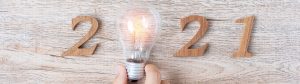 2021 spelled out in wood with lightbulb as zero for best of 2021 blog
